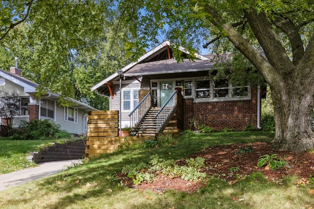 view of front of home with a front yard