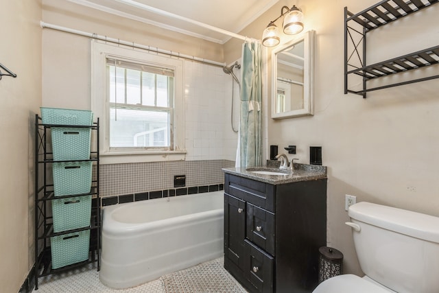 bathroom featuring crown molding, vanity, toilet, and tile patterned floors