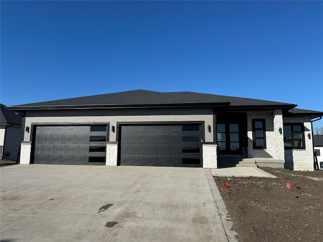 prairie-style house with a garage