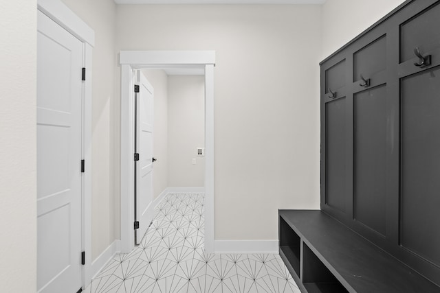 mudroom featuring baseboards