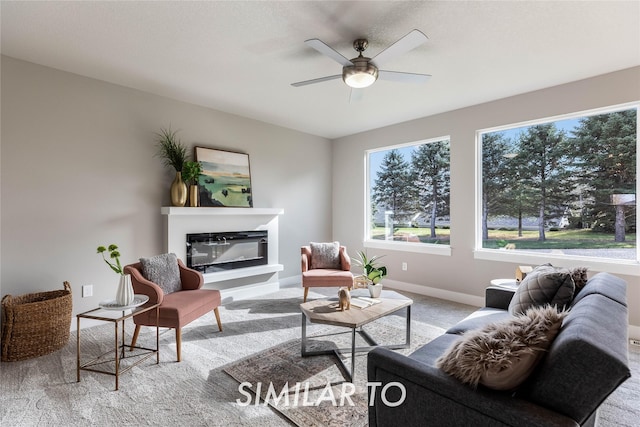 living room with ceiling fan and light carpet