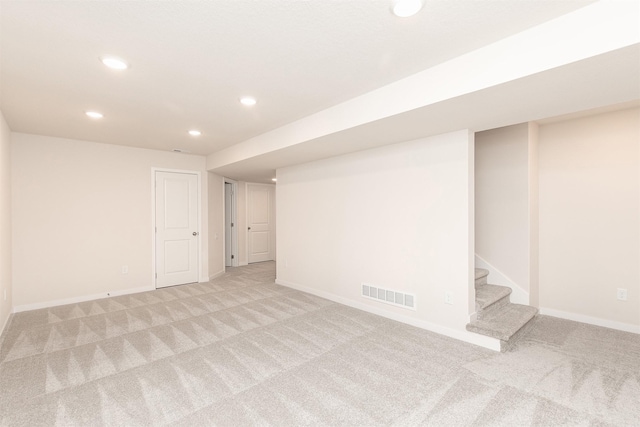 basement with light carpet