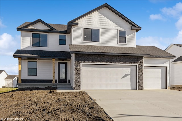 view of front of house with a garage