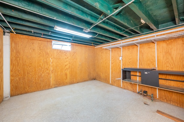 basement with wood walls