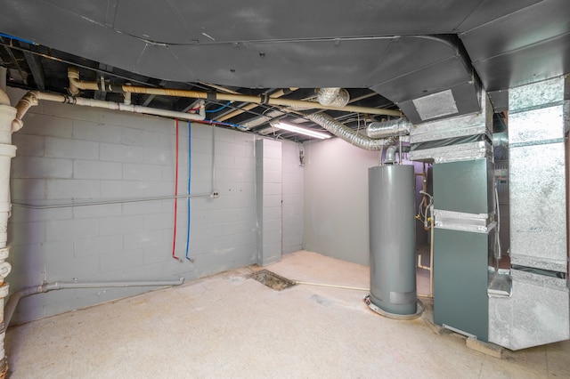 basement with gas water heater and heating unit