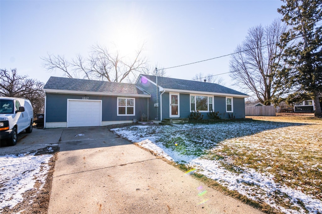 single story home with a garage
