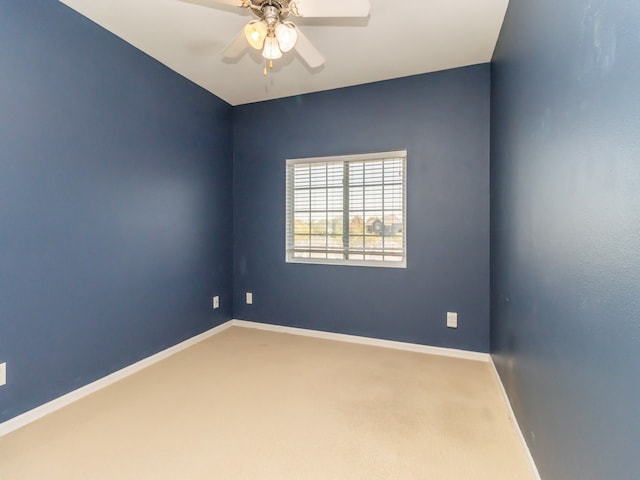 carpeted empty room with ceiling fan