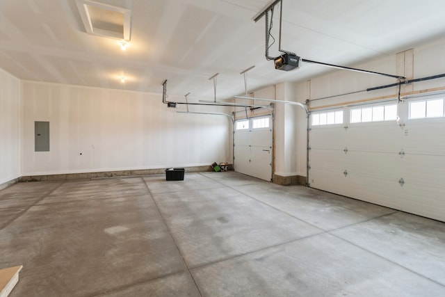 garage with electric panel and a garage door opener