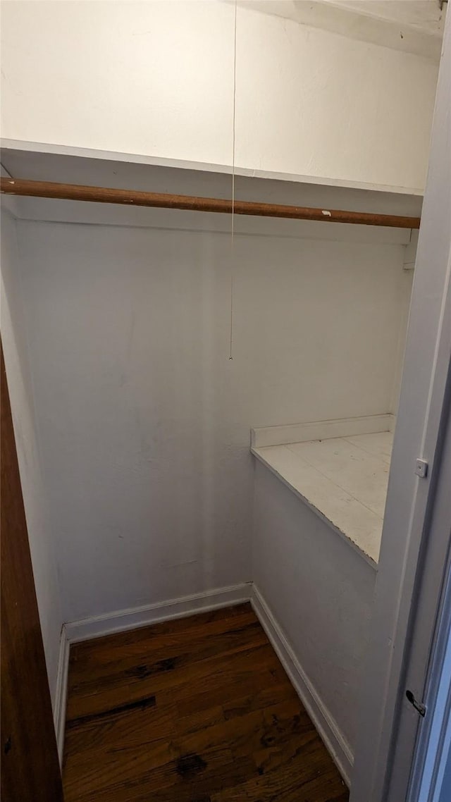 5711 Franklin Ave, Des Moines, IA 50310 - spacious closet featuring dark wood-style floors