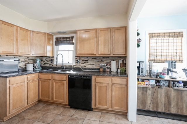 kitchen with black dishwasher, sink, light tile patterned flooring, and backsplash