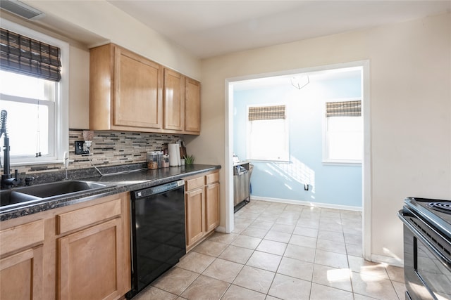 kitchen with black dishwasher, tasteful backsplash, plenty of natural light, and electric stove