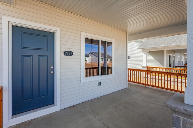 entrance to property with covered porch