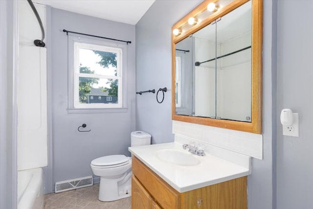 full bathroom featuring vanity, toilet, and shower / bathtub combination