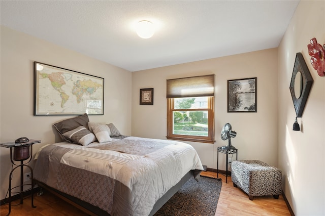 bedroom featuring light wood-type flooring