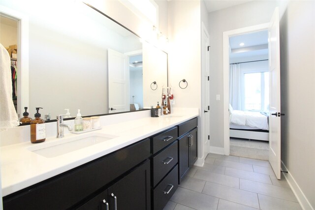 bathroom with vanity and tile patterned floors