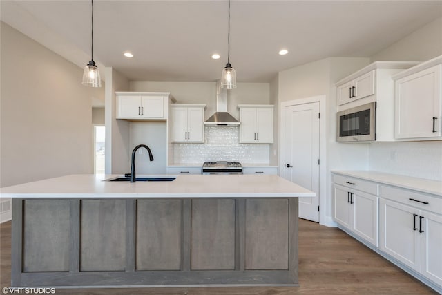 kitchen featuring a large island and built in microwave