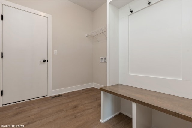 laundry room with hookup for a washing machine and hardwood / wood-style floors