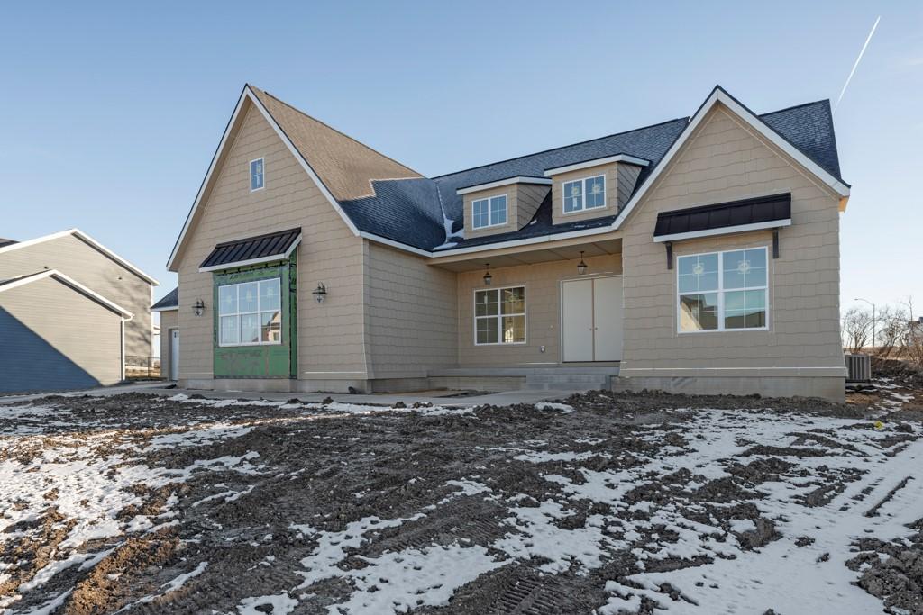 view of front of home with central AC