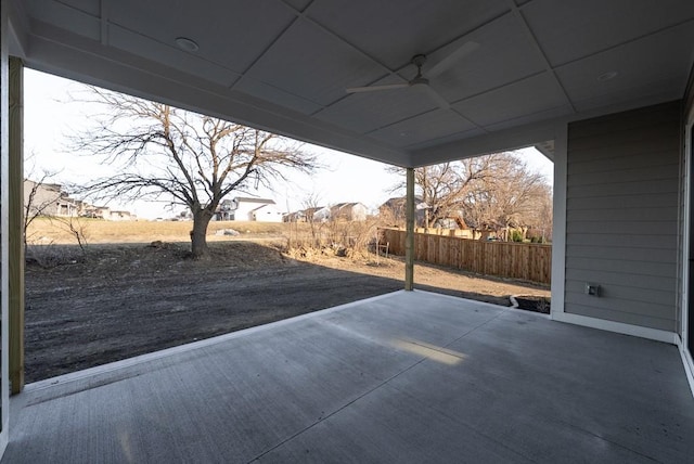 5807 NE Sherman Ct, Ankeny, IA 50021 - view of patio / terrace with a ceiling fan and fence