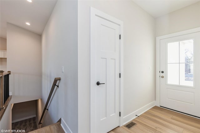 entrance foyer with light wood-type flooring