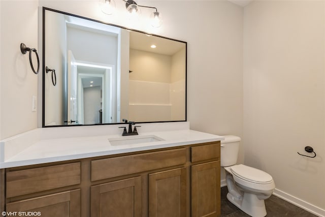 bathroom featuring walk in shower, tile patterned floors, vanity, and toilet