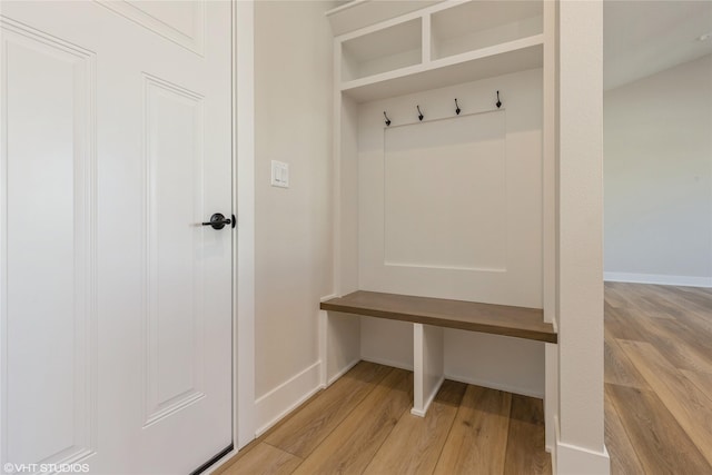 mudroom with light hardwood / wood-style flooring