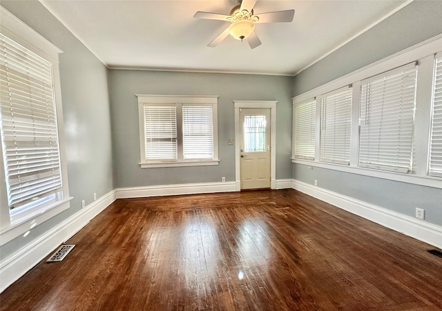 interior space with ceiling fan and dark wood-type flooring