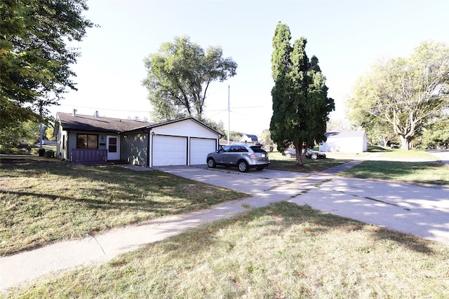 exterior space with a garage and a front yard