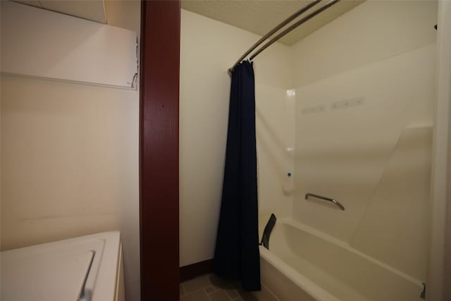 bathroom featuring shower / tub combo and tile patterned flooring