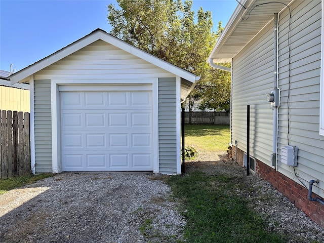 garage with a lawn