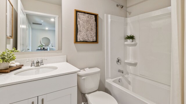 full bathroom featuring vanity,  shower combination, and toilet