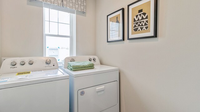 laundry area featuring washing machine and dryer