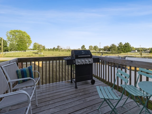 wooden terrace with area for grilling