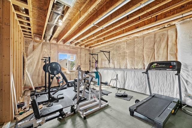 workout room featuring concrete flooring