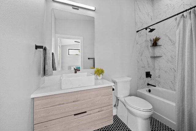 full bathroom with vanity, tile patterned floors, toilet, and shower / bath combo