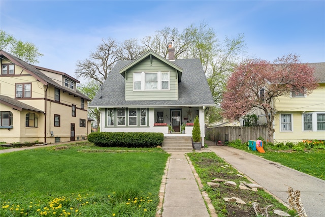 view of front of home with a front lawn