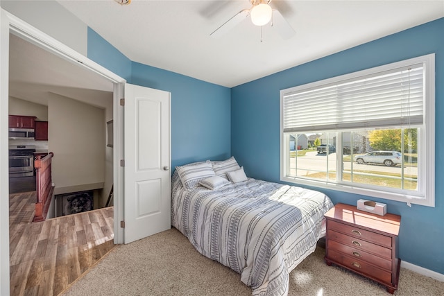 bedroom with carpet flooring and ceiling fan