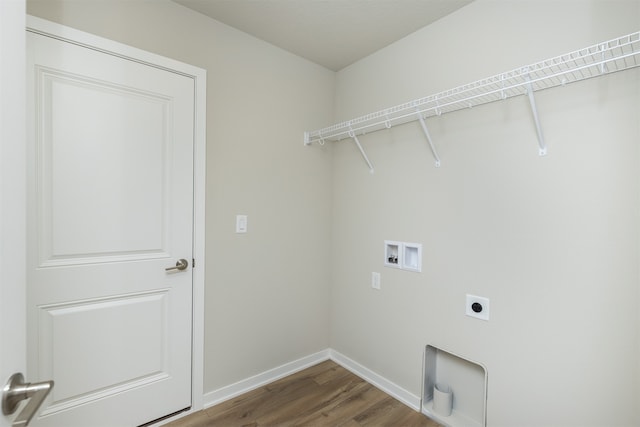 laundry area featuring hardwood / wood-style floors, electric dryer hookup, and washer hookup