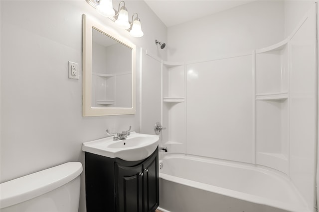 full bathroom with toilet, washtub / shower combination, and vanity