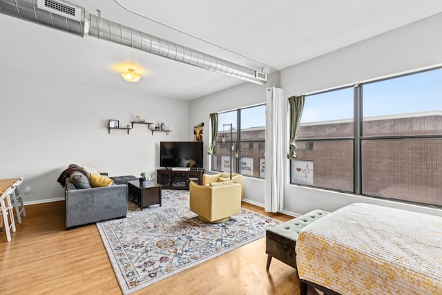 bedroom featuring hardwood / wood-style floors