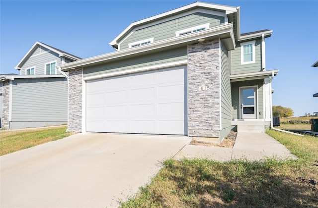 view of front of property featuring a garage