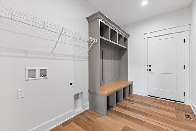 mudroom with wood-type flooring