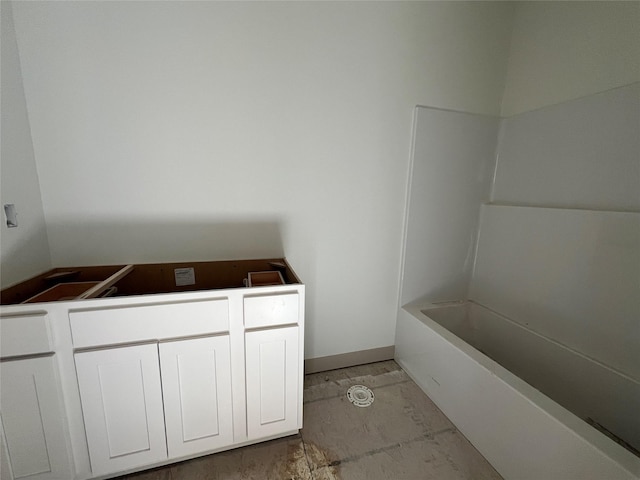 bathroom with a washtub