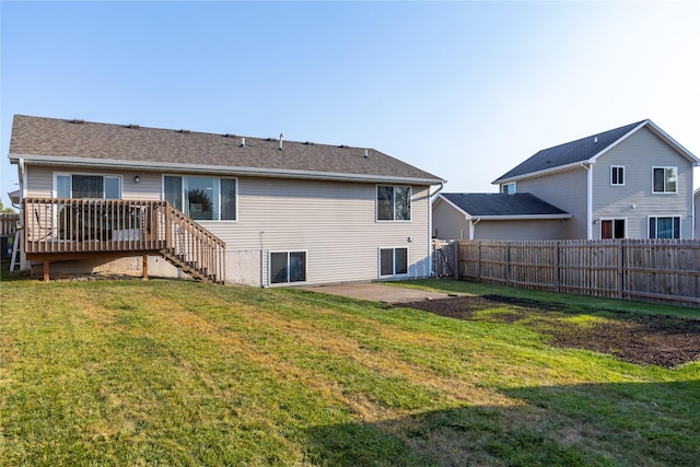 14603 Westbrook Dr, Urbandale, IA 50323 - back of property with fence, a yard, and stairway