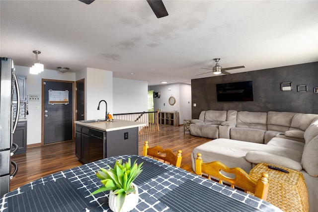 14603 Westbrook Dr, Urbandale, IA 50323 - living room with dark wood-style flooring and ceiling fan