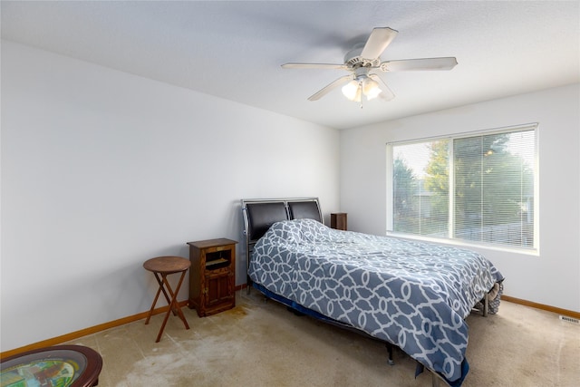 14603 Westbrook Dr, Urbandale, IA 50323 - bedroom featuring baseboards, light colored carpet, and ceiling fan