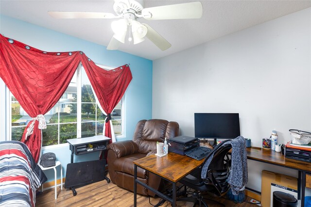 14603 Westbrook Dr, Urbandale, IA 50323 - office with a ceiling fan and wood finished floors
