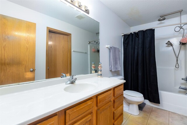 14603 Westbrook Dr, Urbandale, IA 50323 - full bath with tile patterned floors, vanity, shower / bath combination with curtain, toilet, and visible vents