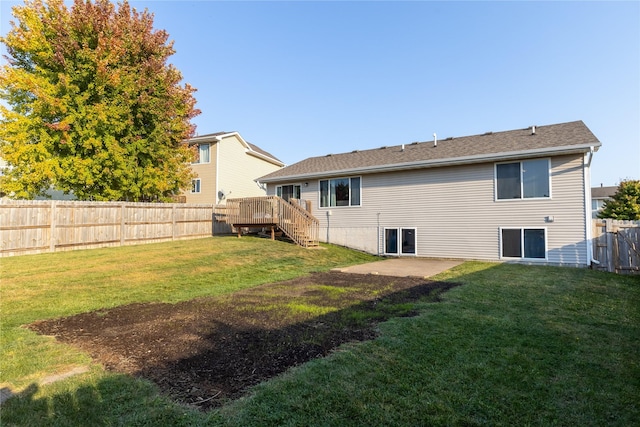14603 Westbrook Dr, Urbandale, IA 50323 - rear view of property with stairs, a yard, a fenced backyard, and a deck