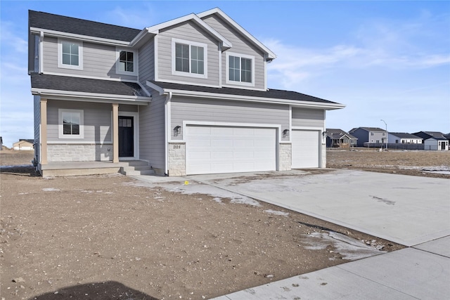 view of front of property with a garage